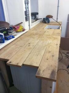 Worktop made from reclaimed wooden floorboards